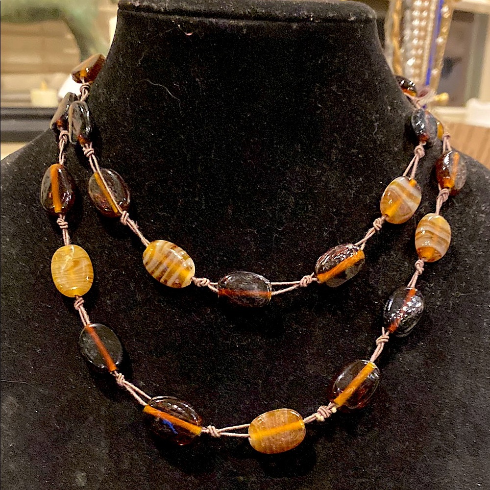 1 Strand Art Glass Necklace in Amber Tones.